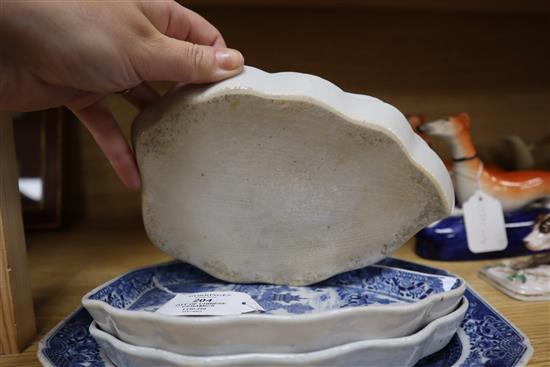 Four Chinese blue and white leaf-shaped plates, three matching rectangular serving dishes and a sauce tureen and cover (faults)